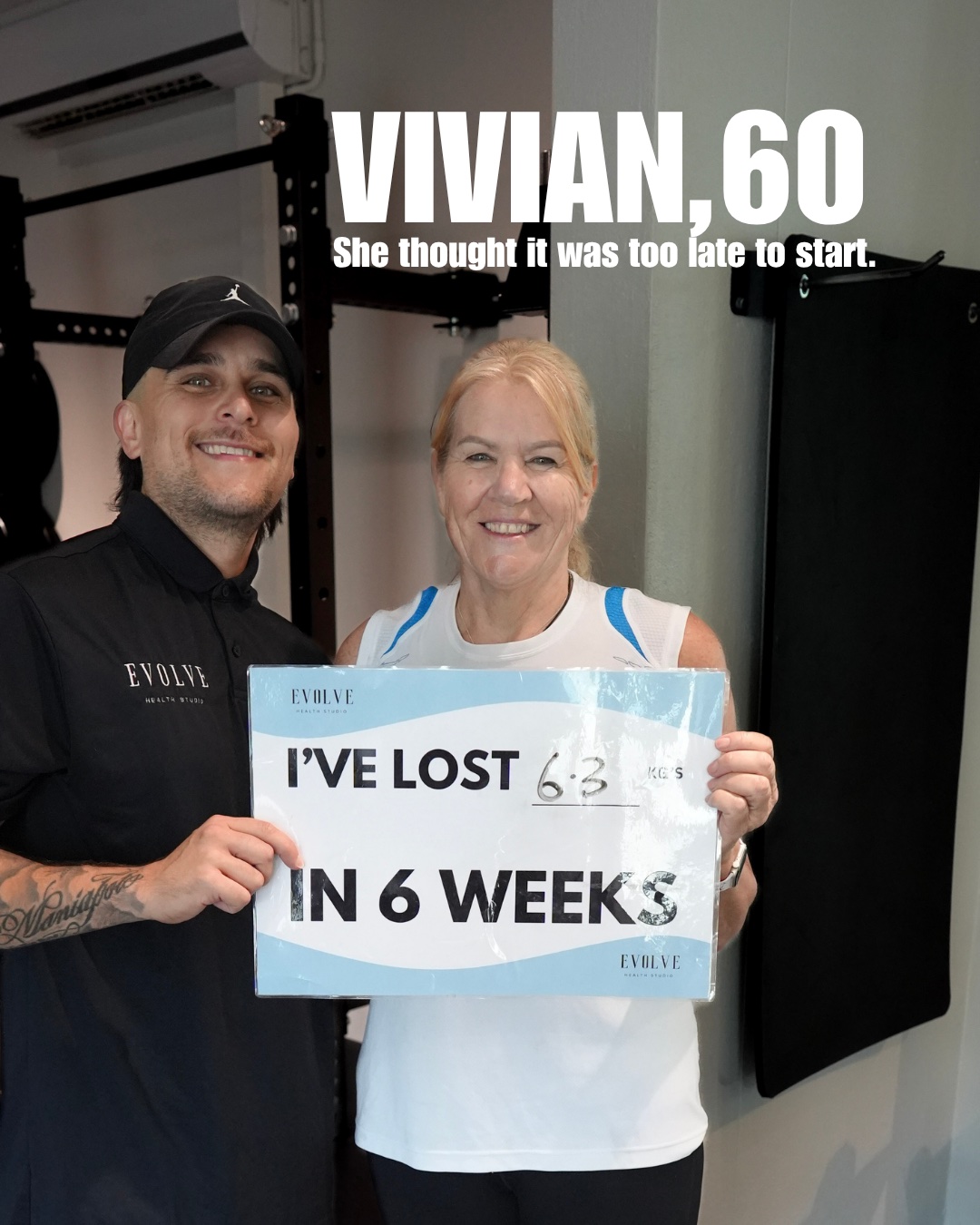 Vivian holding a sign showing 6.3 kg lost